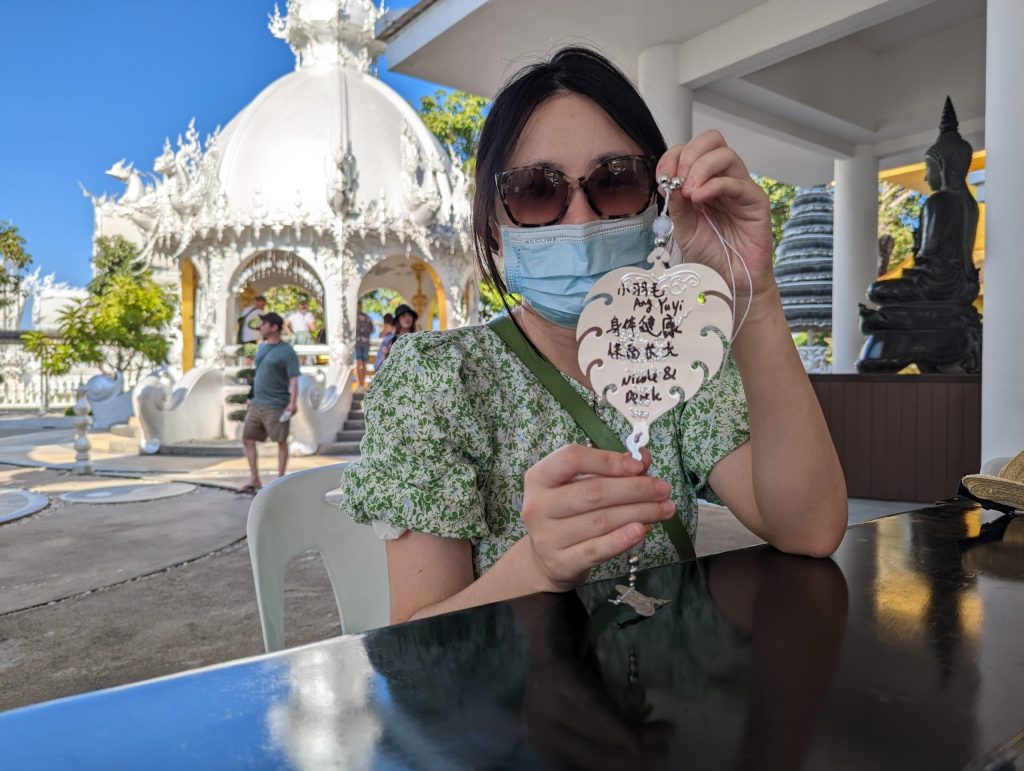 Writing name & wishes in silver Bodhi tree leave / Wat Rong Khun
