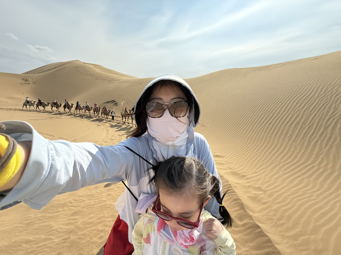 nicole and yuyi riding camel