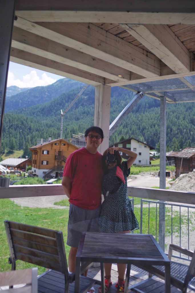 Matterhorn FOCUS Design Hotel Review: Modern Retreat at the Foot of the Alps 6 derek and me at our balcony in our Matterhorn FOCUS Design Hotel room