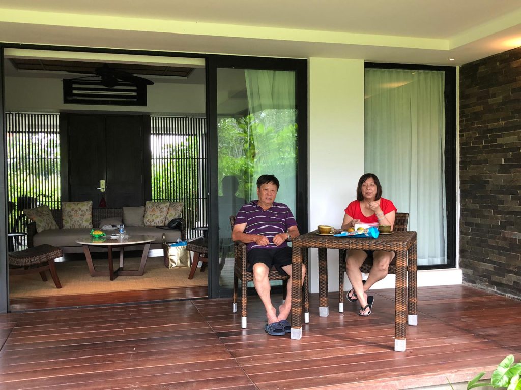 The Residence Bintan Review – Luxury Beachfront Villa Stay 8 mum and dad spending afternoon in villa