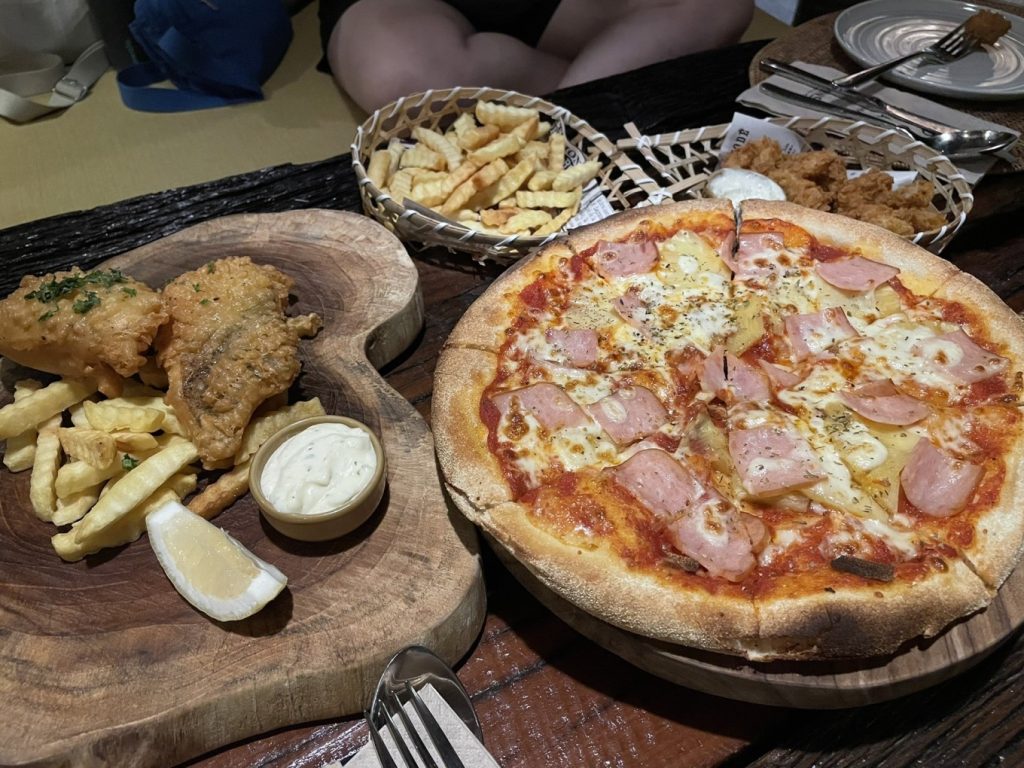 Dinso Resort & Villas dinner, pizza, chicken wings, fries