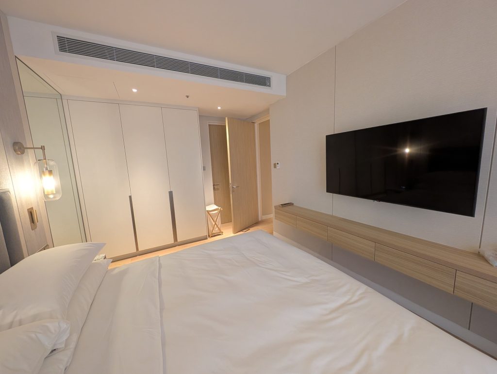 Marriott Executive Apartments Kuala Lumpur Review: Our 2-Night Family Stay 15 Built-in wardrobe and wall-mounted TV inside the master bedroom at Marriott Executive Apartments Kuala Lumpur.