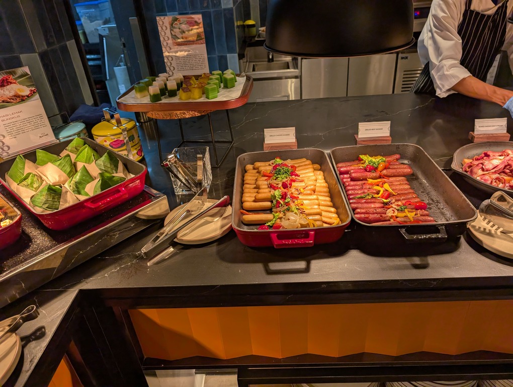 Marriott Executive Apartments Kuala Lumpur Review: Our 2-Night Family Stay 28 Assorted sausages, nasi lemak packets, and Western breakfast dishes at the buffet of Marriott Executive Apartments Kuala Lumpur.