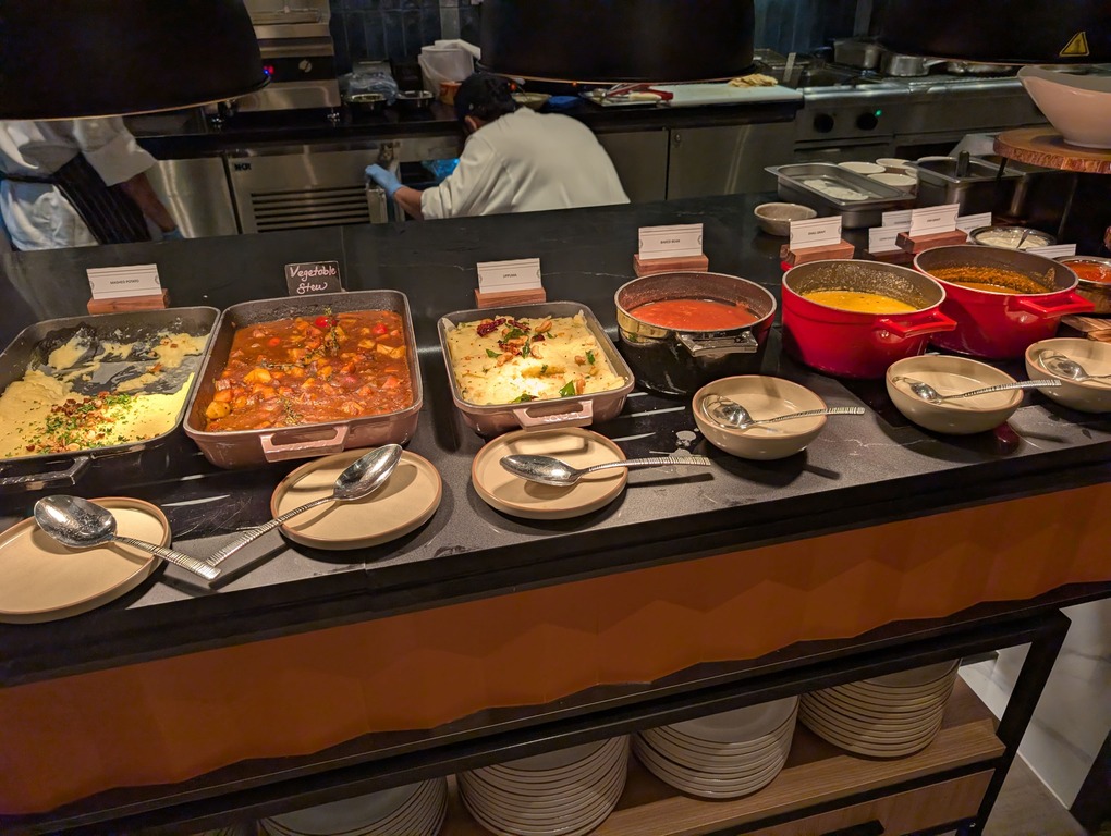 Marriott Executive Apartments Kuala Lumpur Review: Our 2-Night Family Stay 27 Breakfast buffet trays containing mashed potatoes, vegetable stew, tomato sauce, and curry at Marriott Executive Apartments Kuala Lumpur.