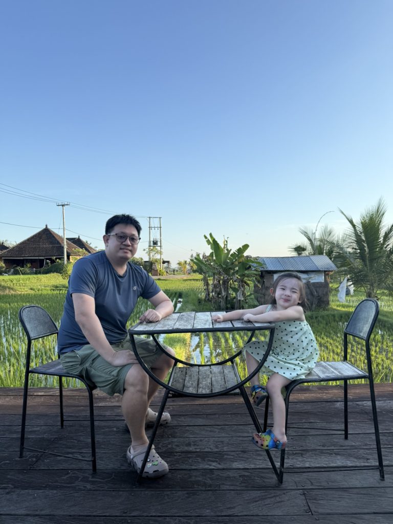 The Sun of Granary Resort and Villas Review: Family Stay Amid Ubud’s Rice Fields 12 Daddy and Little One enjoying ubud rice field views