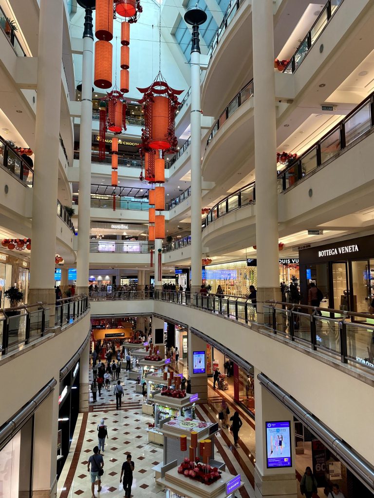 Suria KLCC shopping mall interior located beneath the Petronas Twin Towers in Kuala Lumpur