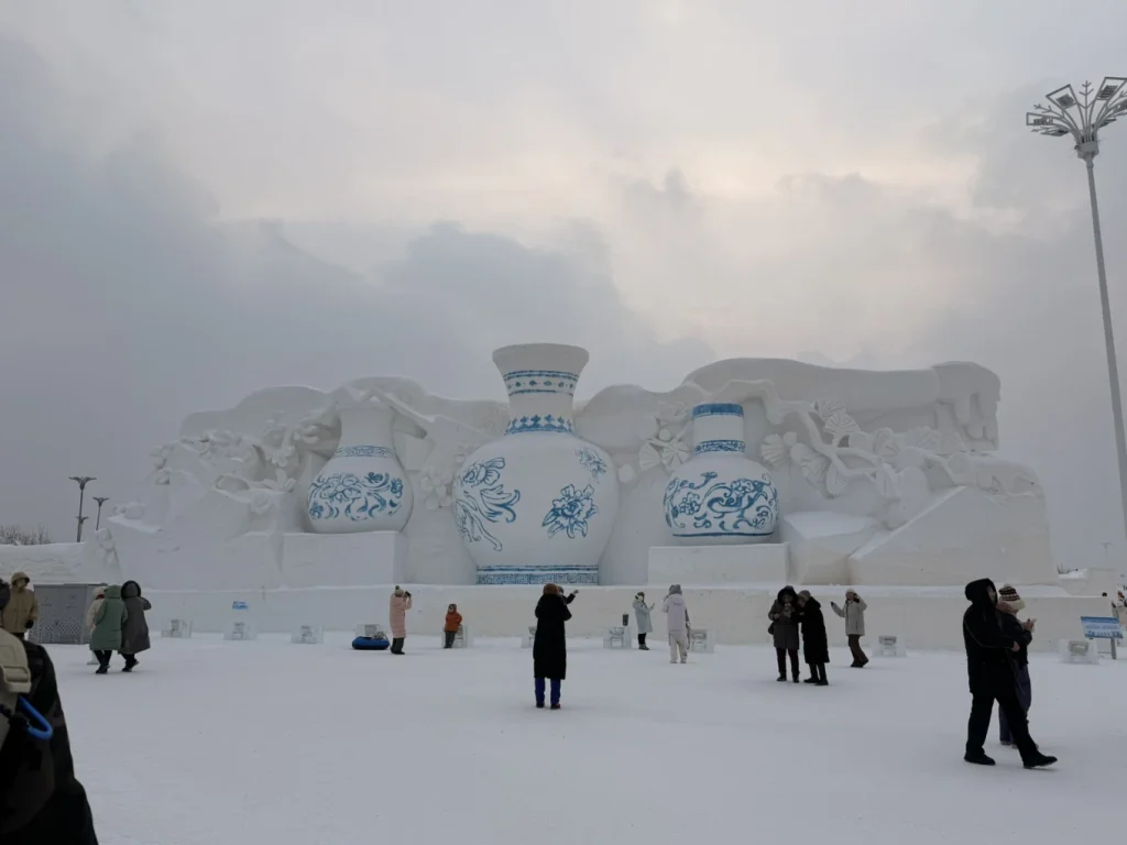Visit to Harbin Ice and Snow World: What It’s Really Like 9 Large snow sculpture featuring blue-and-white porcelain-style vases at Harbin Ice and Snow World