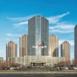 JW Marriott Hotel Harbin River North exterior in Songbei District beneath a clear blue sky