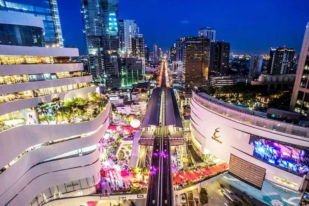 Where to Stay in Sukhumvit Bangkok: Best Areas, Hotels & Travel Tips 8 Phrom Phong skyline with BTS station and shopping malls along Sukhumvit Road in Bangkok at night