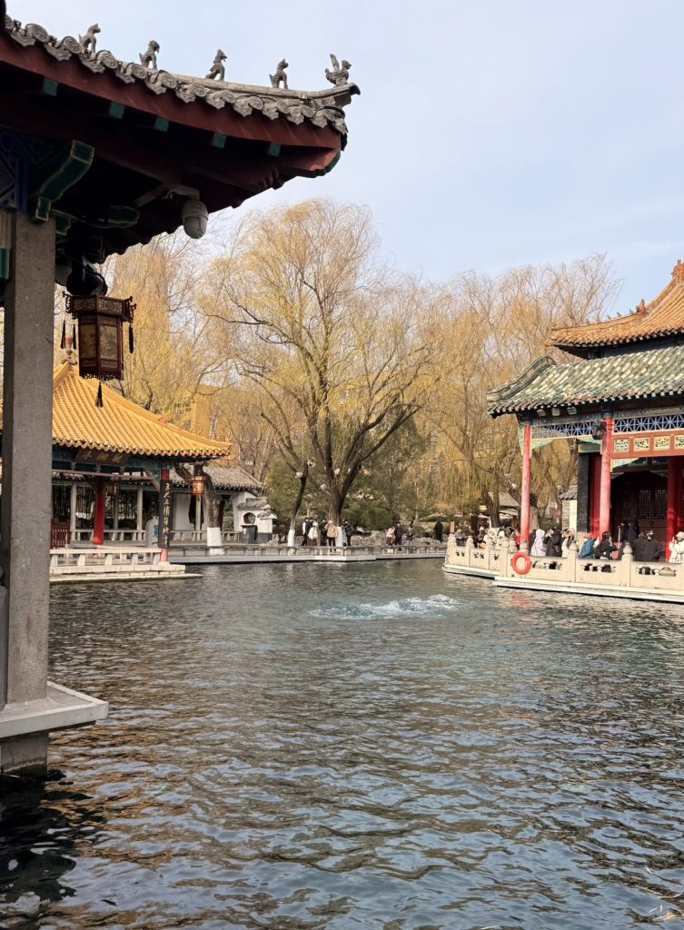 Baotu Spring Travel Guide: Visiting Jinan’s No.1 Spring 6 Baotu Spring in Jinan with traditional pavilion and bubbling spring water in winter