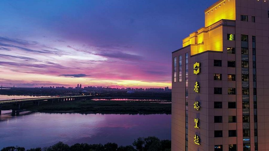 Where to Stay in Harbin: Best Areas & Hotels for Winter Travel 10 Shangri-La Hotel Harbin overlooking the Songhua River at sunset