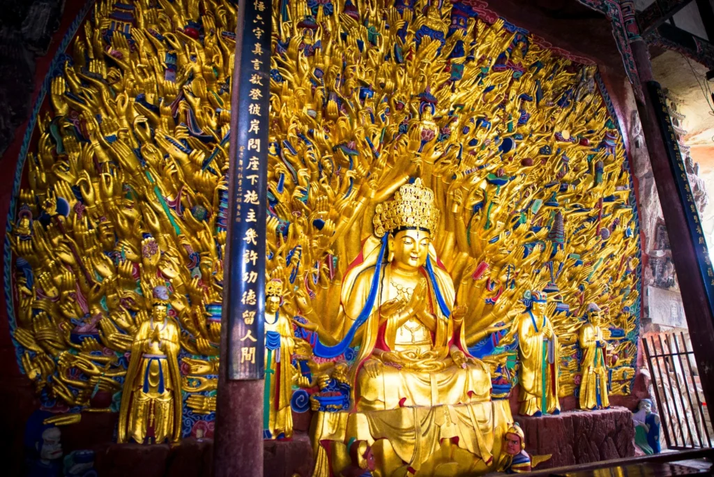 Dazu Rock Carvings Chongqing: Complete Guide to the UNESCO Buddhist Site 8 Thousand-Hand Guanyin golden statue at Baodingshan Dazu Rock Carvings in Chongqing.