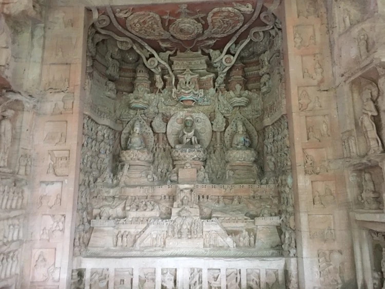 Dazu Rock Carvings Chongqing: Complete Guide to the UNESCO Buddhist Site 6 Interior carved stone shrine with multiple Buddhist figures at Dazu Rock Carvings Beishan site.