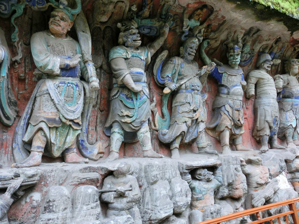 Dazu Rock Carvings Chongqing: Complete Guide to the UNESCO Buddhist Site 11 Guardian warrior statues carved in stone at Dazu Rock Carvings Baodingshan.