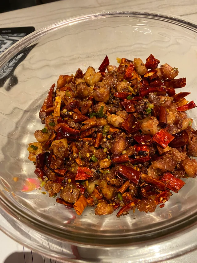 La Zi Ji Chongqing spicy fried chicken with dried red chilies and Sichuan peppercorns