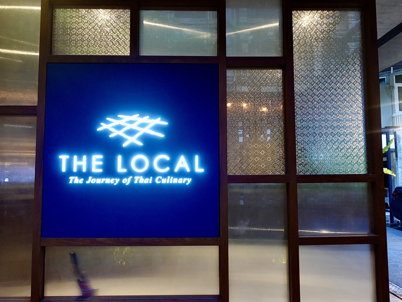 The Local Bangkok illuminated sign at entrance near Asok BTS station