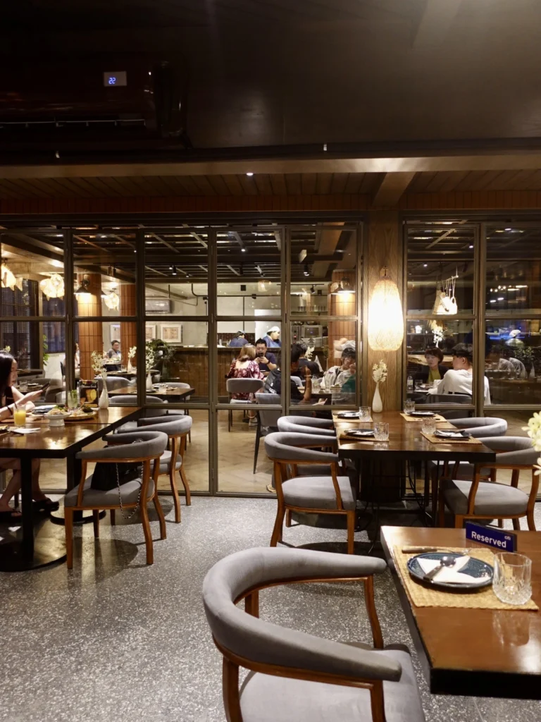 Interior dining area at The Local Bangkok Michelin-recommended Thai restaurant