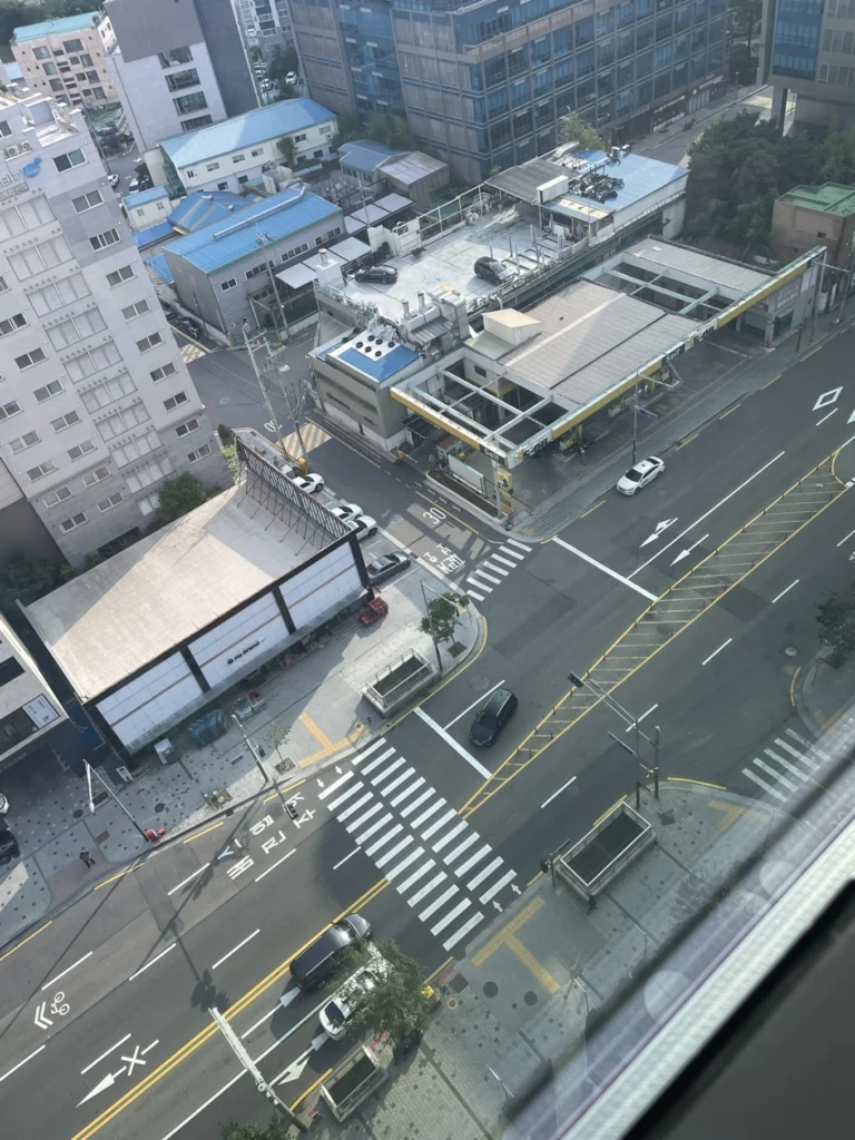 City street intersection view from Union Hotel Seoul room near Seonyudo subway station