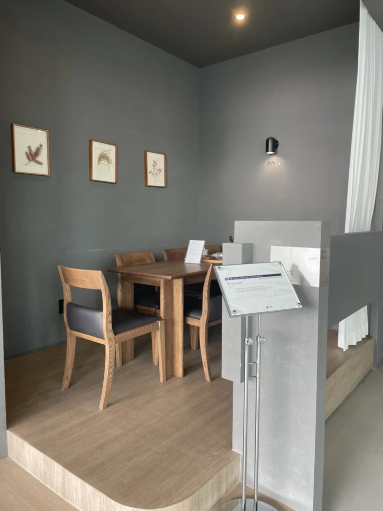 Private dining room setup inside Union Hotel Seoul with wooden table and minimalist decor