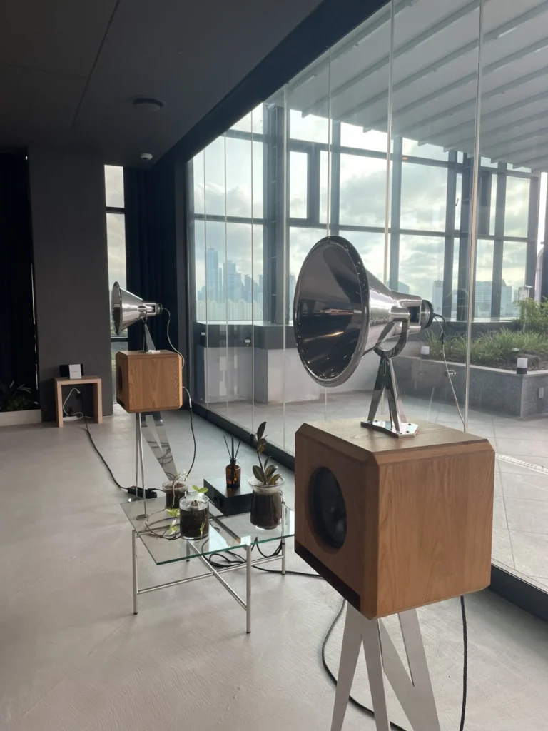 Union Hotel Seoul music hall featuring vintage-style horn speakers and city skyline view