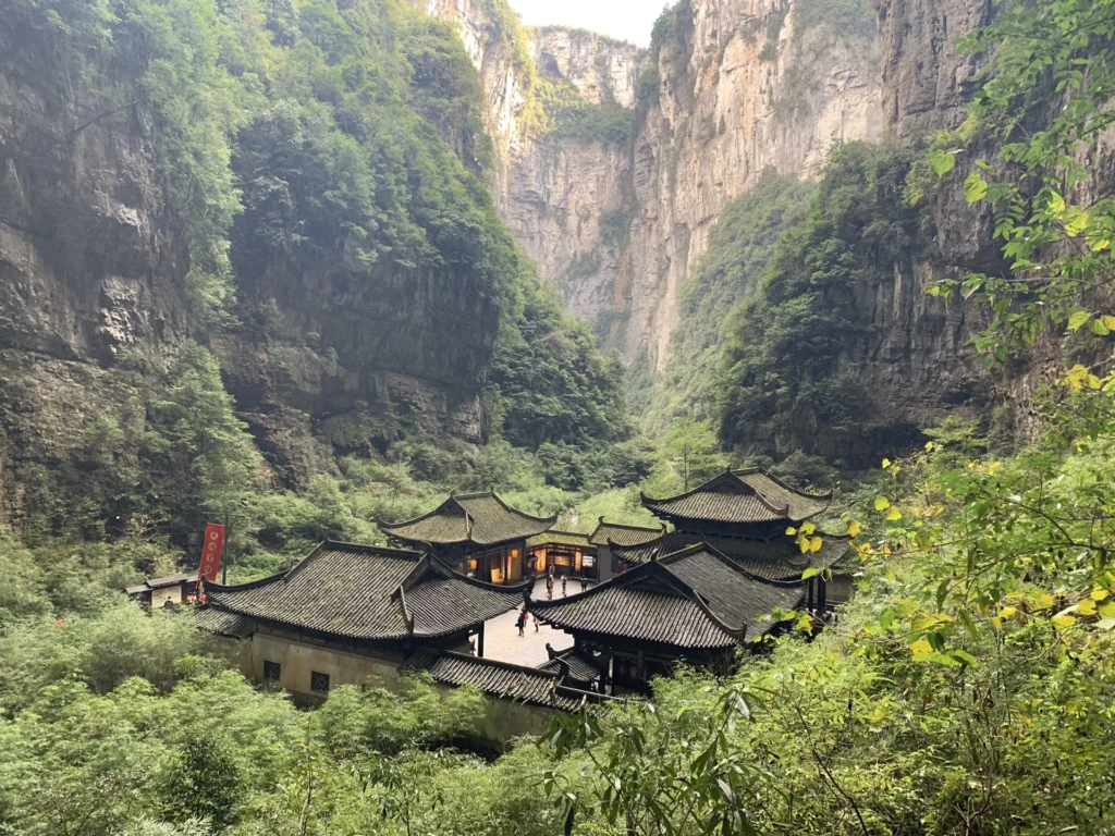 Traditional Chinese courtyard film set inside the Three Natural Bridges sinkhole at Wulong Karst