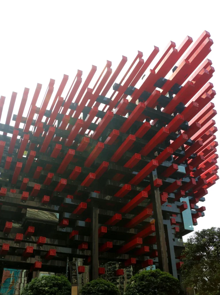 Chongqing Art Gallery underside view showing geometric red beam structure from below