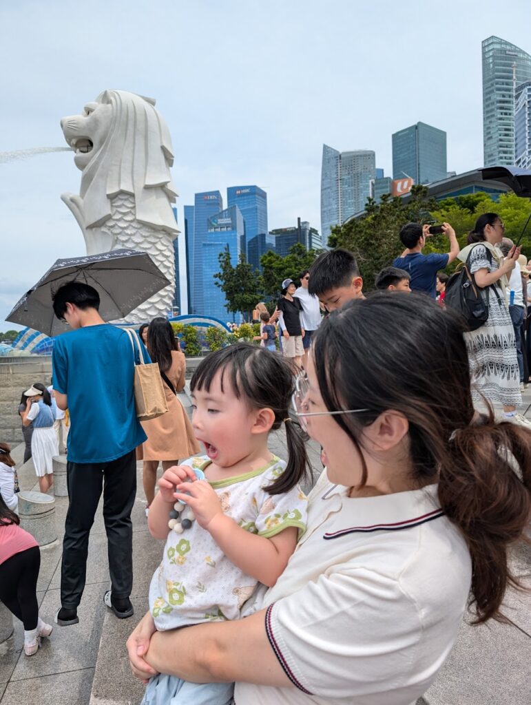 Merlion Park Singapore: The Complete Visitor's Guide 7 Busy promenade at Merlion Park Singapore with Merlion statue and Marina Bay skyline