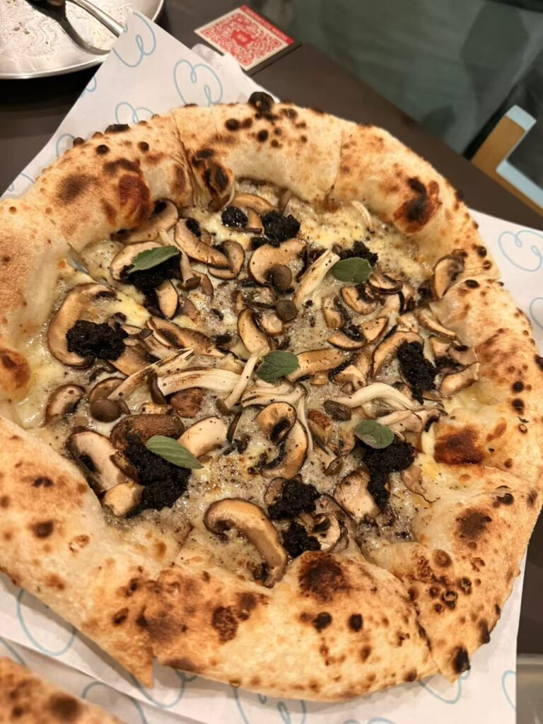 truffle mushroom sourdough pizza with Swiss brown and shimeji mushrooms