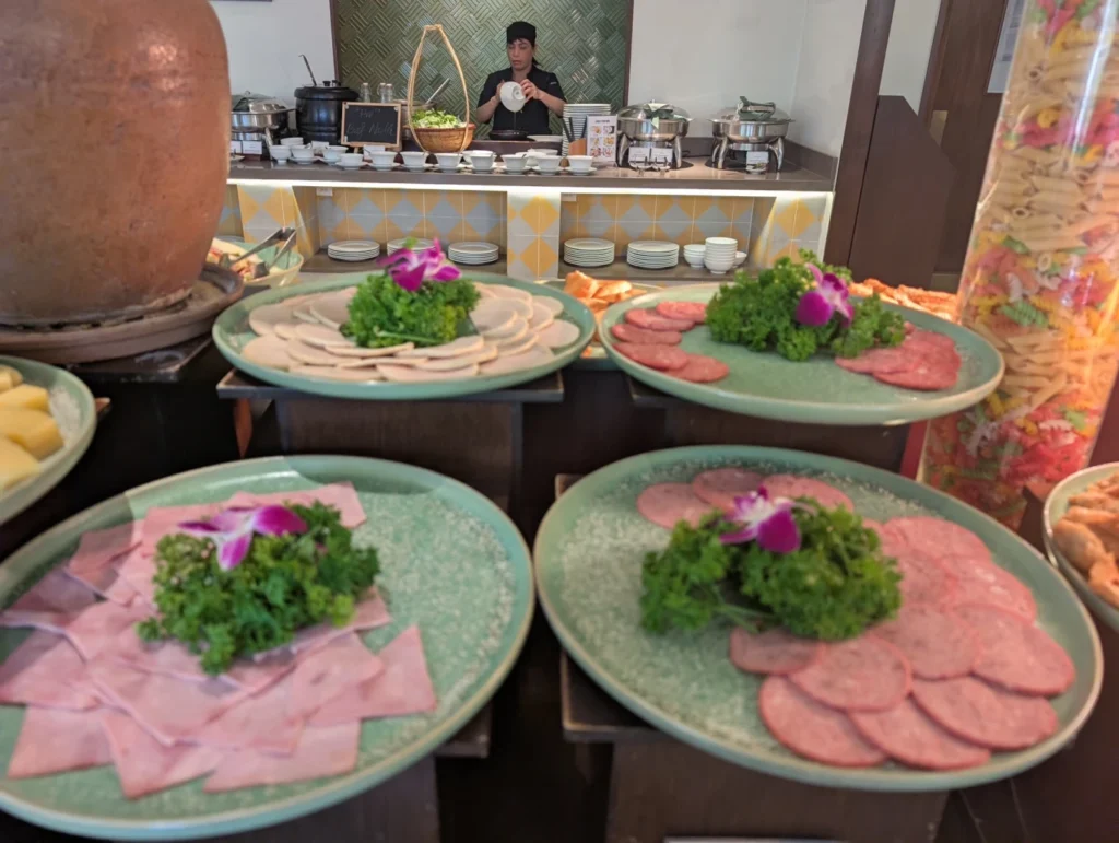 Cozy Danang Boutique Hotel breakfast buffet with cold cuts and Vietnamese dishes