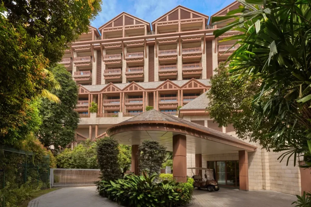 Equarius Hotel Resorts World Sentosa exterior surrounded by lush greenery with spacious family-friendly accommodation in Singapore
