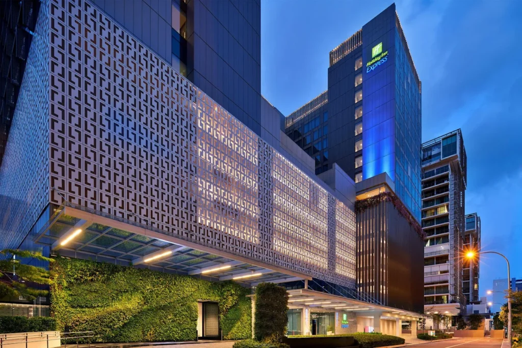 Holiday Inn Express Singapore Katong hotel exterior with modern facade and vertical greenery in Katong neighborhood Singapore
