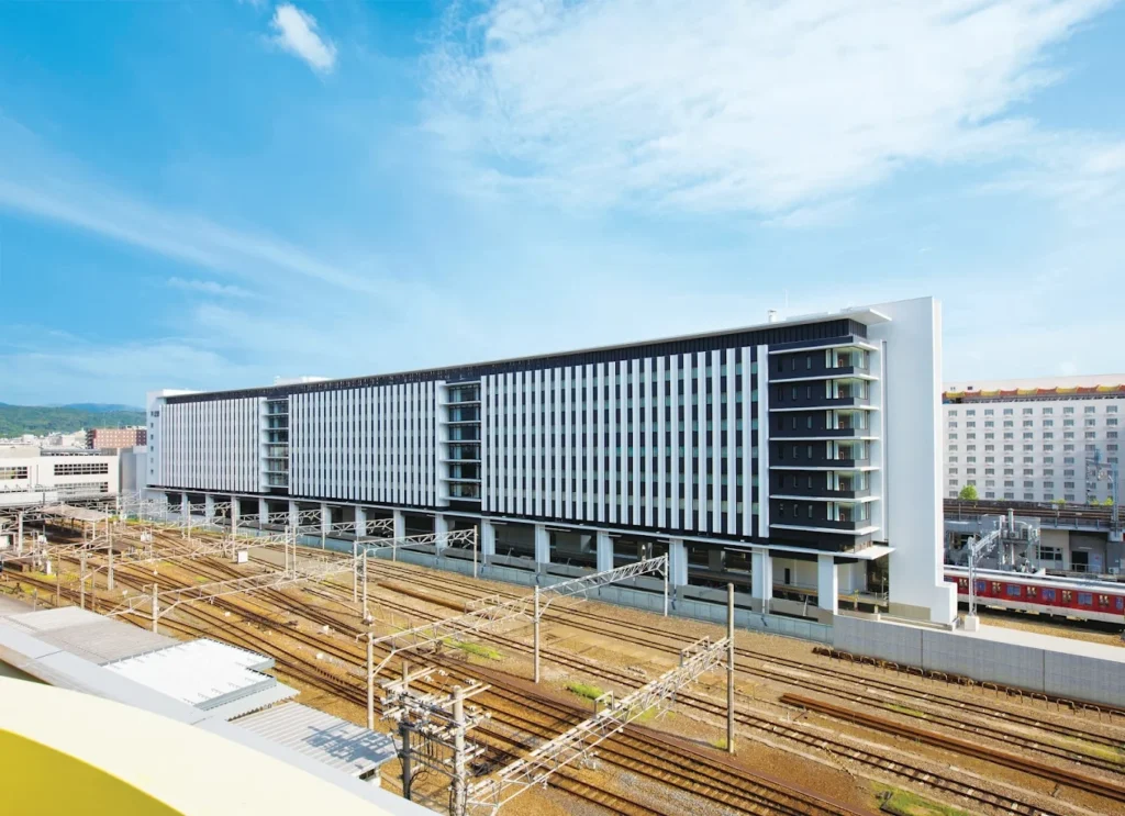 Miyako City Kintetsu Kyoto Station hotel building next to railway tracks near Kyoto Station