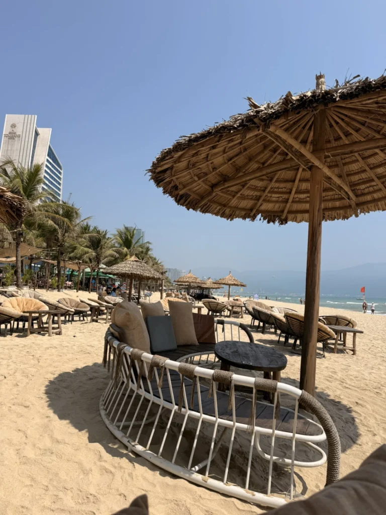 Beachfront lounge chairs and umbrellas at My Khe Beach Da Nang Vietnam