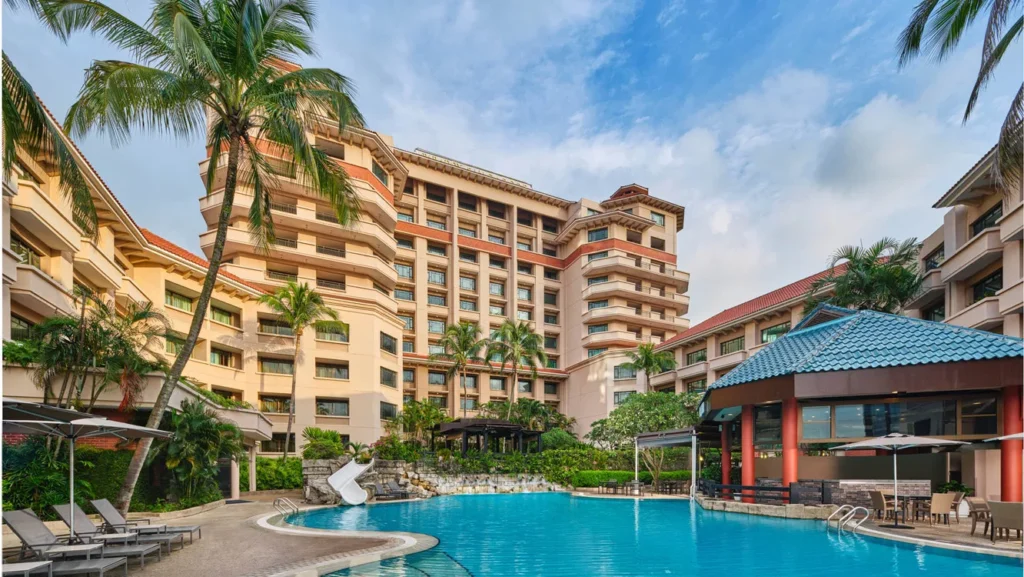 Paradox Singapore Merchant Court hotel pool with tropical landscaping near Clarke Quay, featuring family-friendly amenities and resort-style design