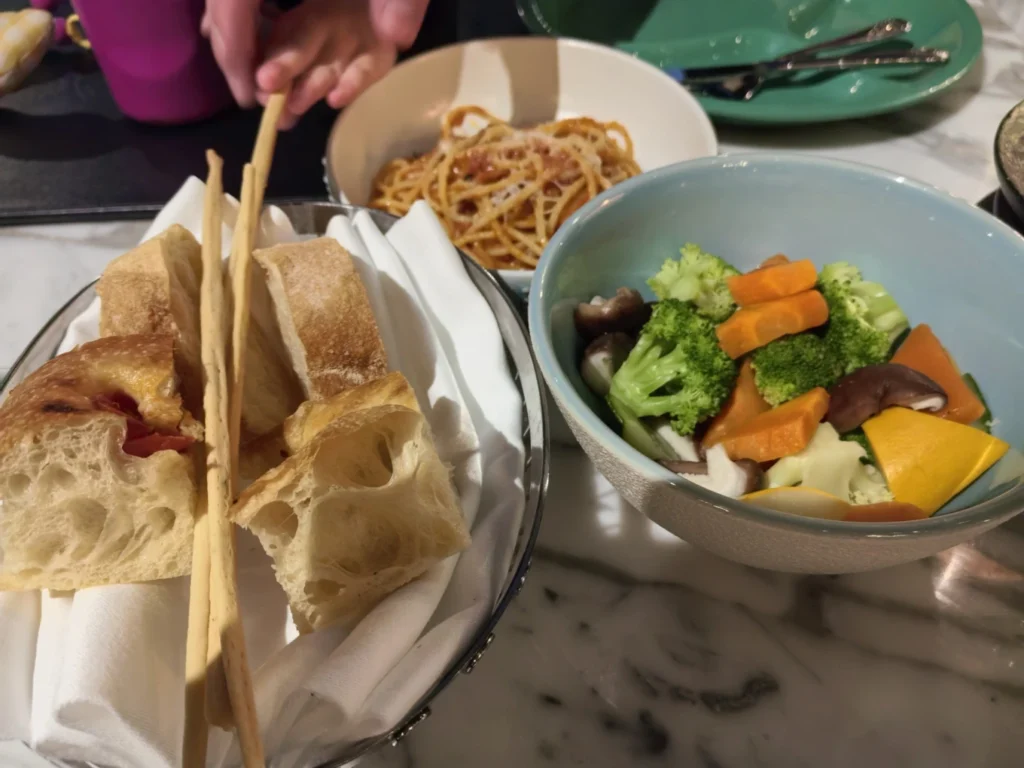 Bread basket with vegetables and pasta dishes at Terra Mare restaurant Danang