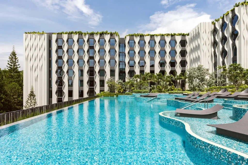 Village Hotel Sentosa swimming pool with modern resort design and family-friendly facilities on Sentosa Island Singapore