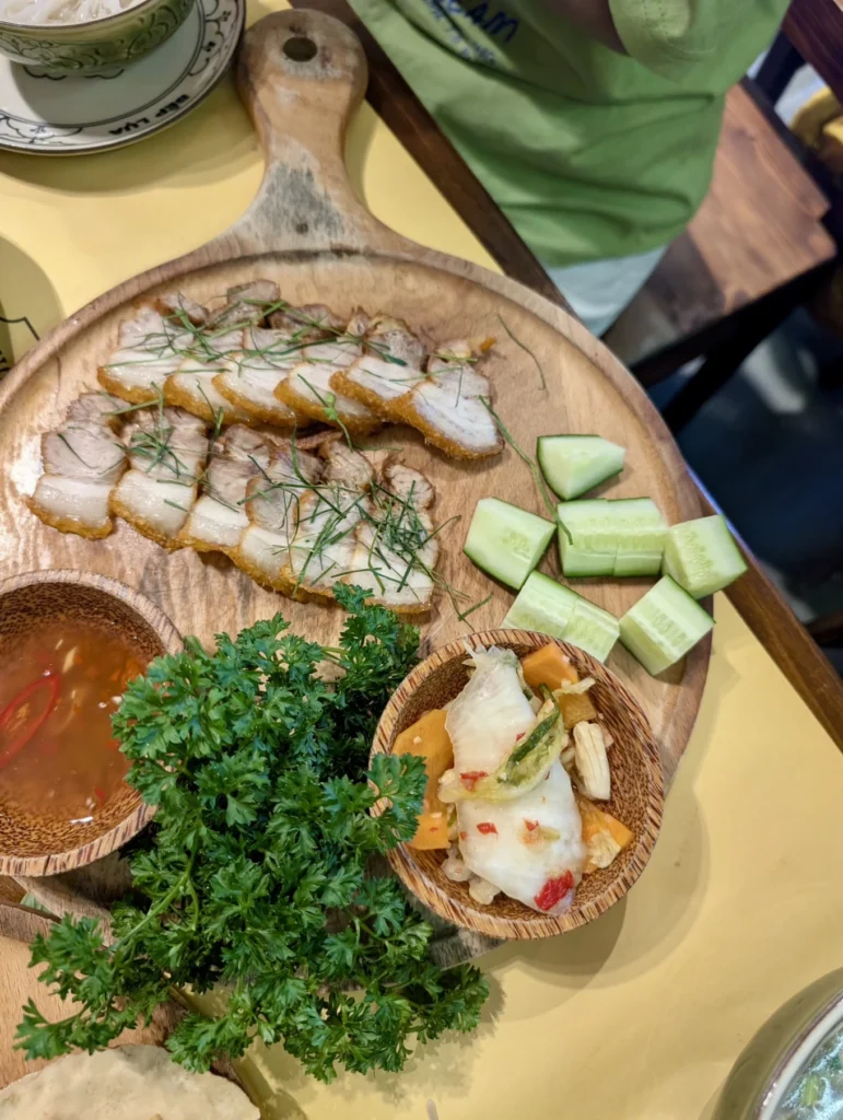 Bếp Lụa Vietnamese Restaurant Review (Da Nang): Worth Skipping Michelin Queues For? 7 Vietnamese crispy pork belly with herbs and dipping sauce at Bếp Lụa