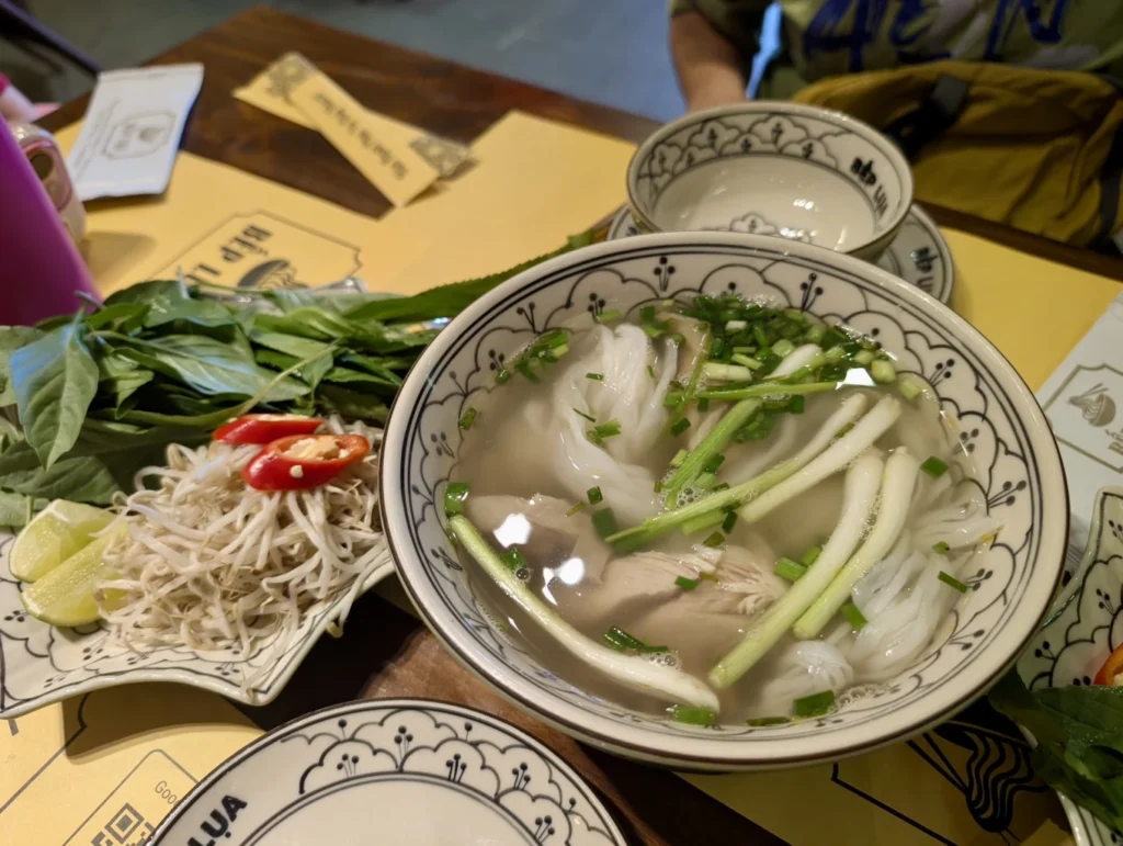 Bếp Lụa Vietnamese Restaurant Review (Da Nang): Worth Skipping Michelin Queues For? 11 Vietnamese pho with herbs and noodles at Bếp Lụa restaurant Da Nang