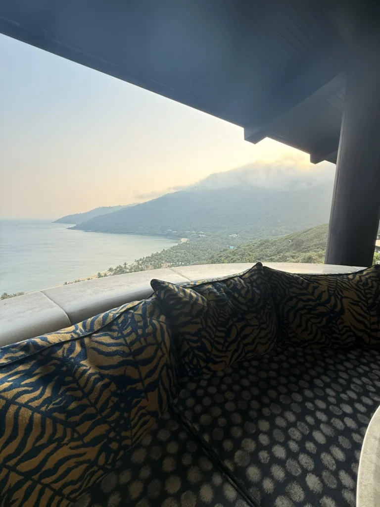 Ocean view from balcony seating at InterContinental Danang Sun Peninsula Resort overlooking Son Tra Peninsula coastline