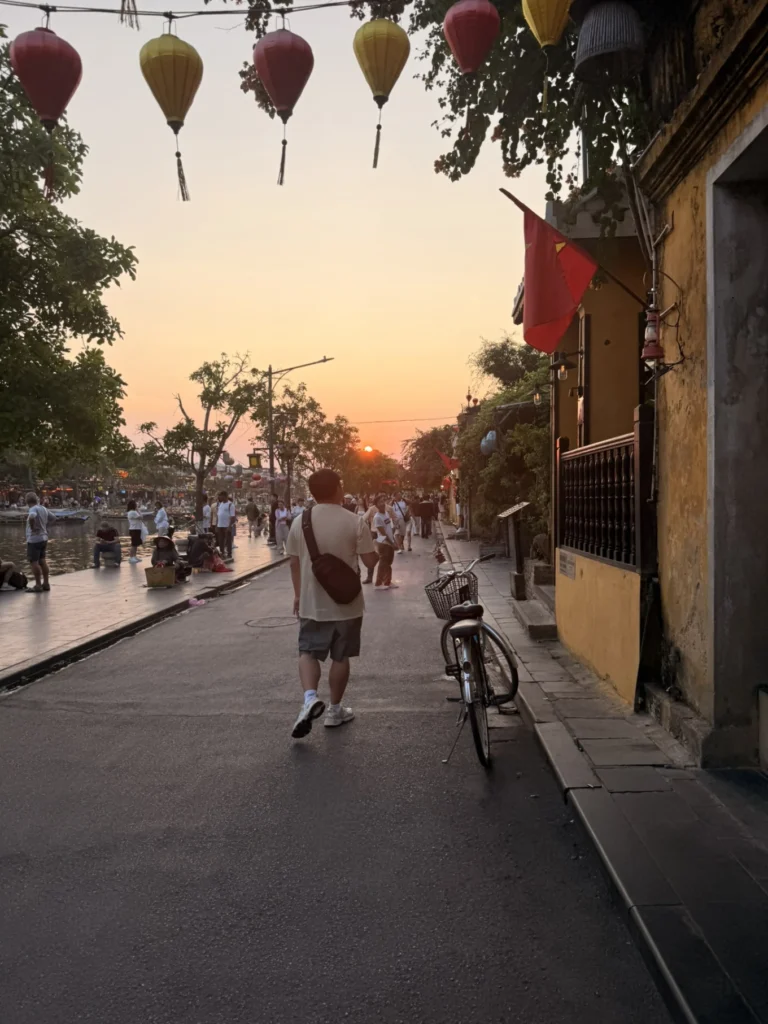 Hoi An Ancient Town sunset street with lanterns and riverside walkway