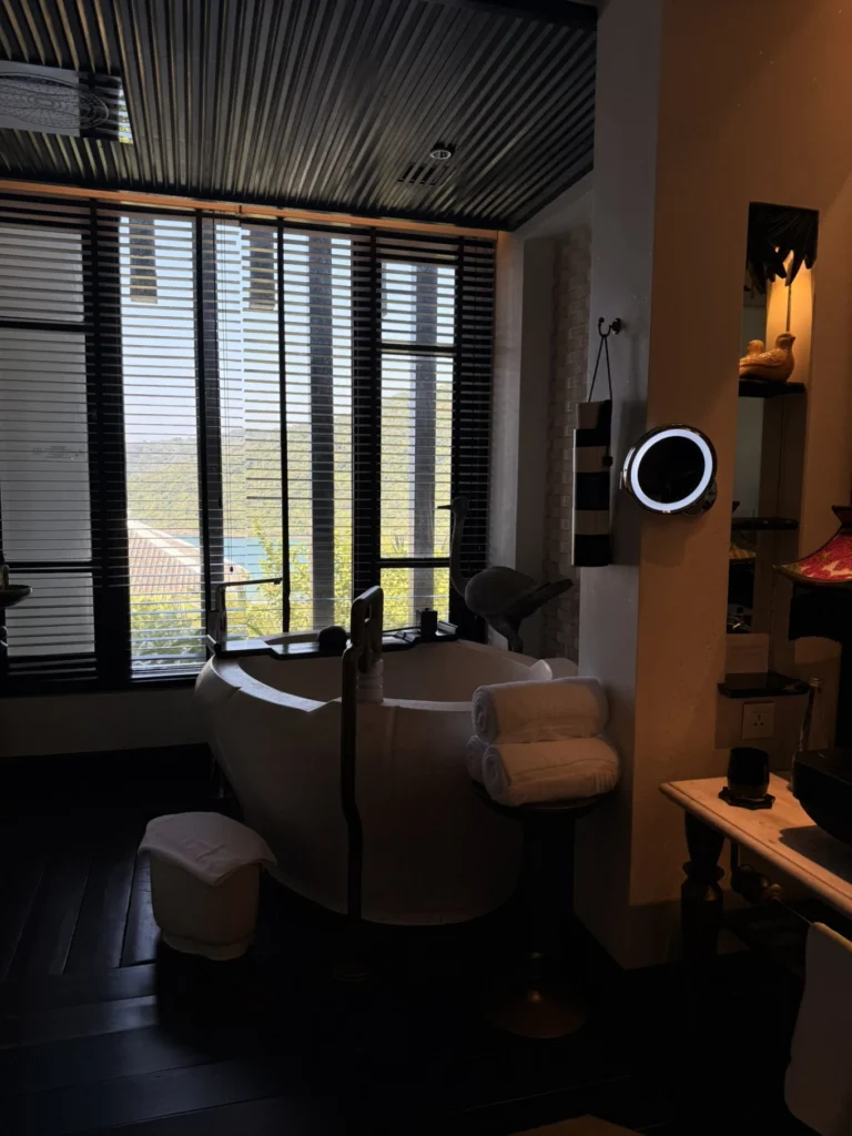 Bathtub beside window with mountain view at InterContinental Danang Sun Peninsula Resort