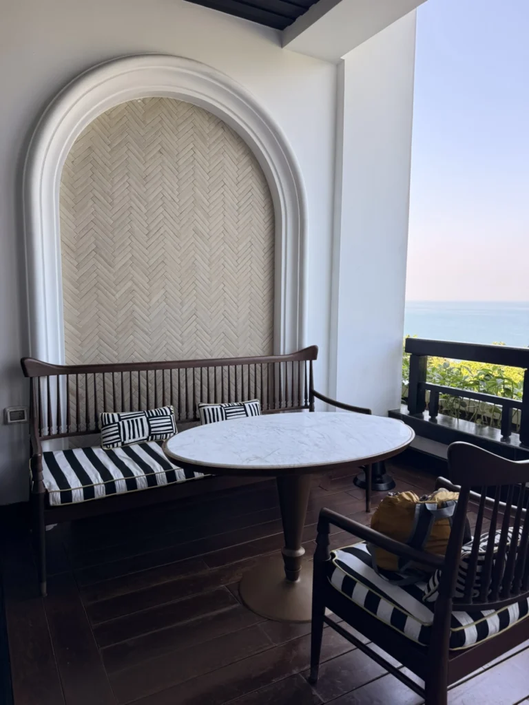 Balcony seating area with ocean view at InterContinental Danang Sun Peninsula Resort
