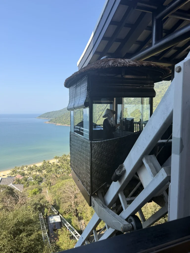 Nam Tram cable car overlooking beach and coastline at InterContinental Danang Sun Peninsula Resort