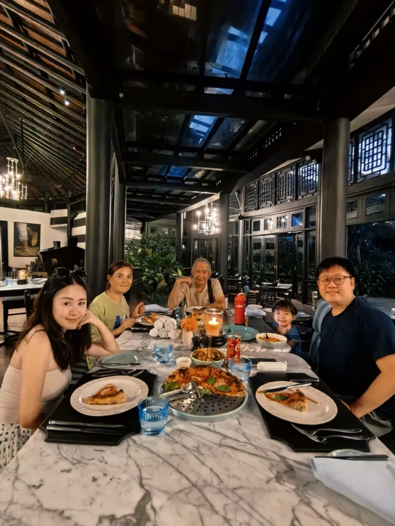 Family dining at restaurant with elegant interior at InterContinental Danang Sun Peninsula Resort