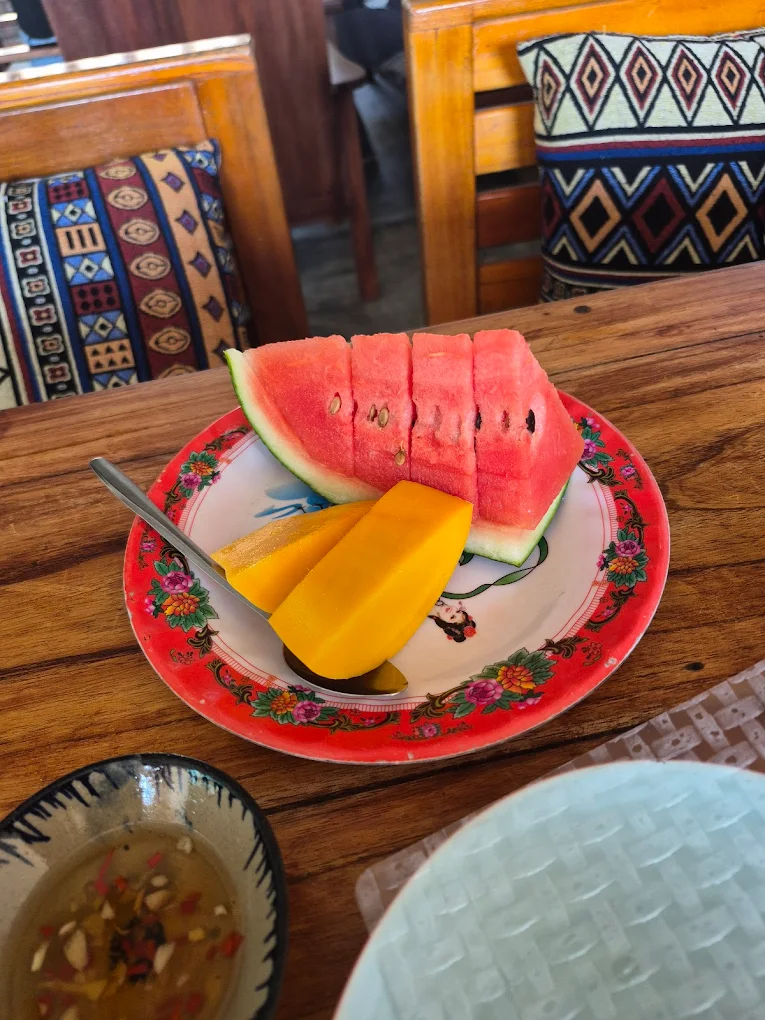 Mate Restaurant and Coffee Hoi An Review: Hidden Café Worth Visiting 13 Complimentary fruit plate with watermelon and mango at Mate Restaurant and Coffee Hoi An
