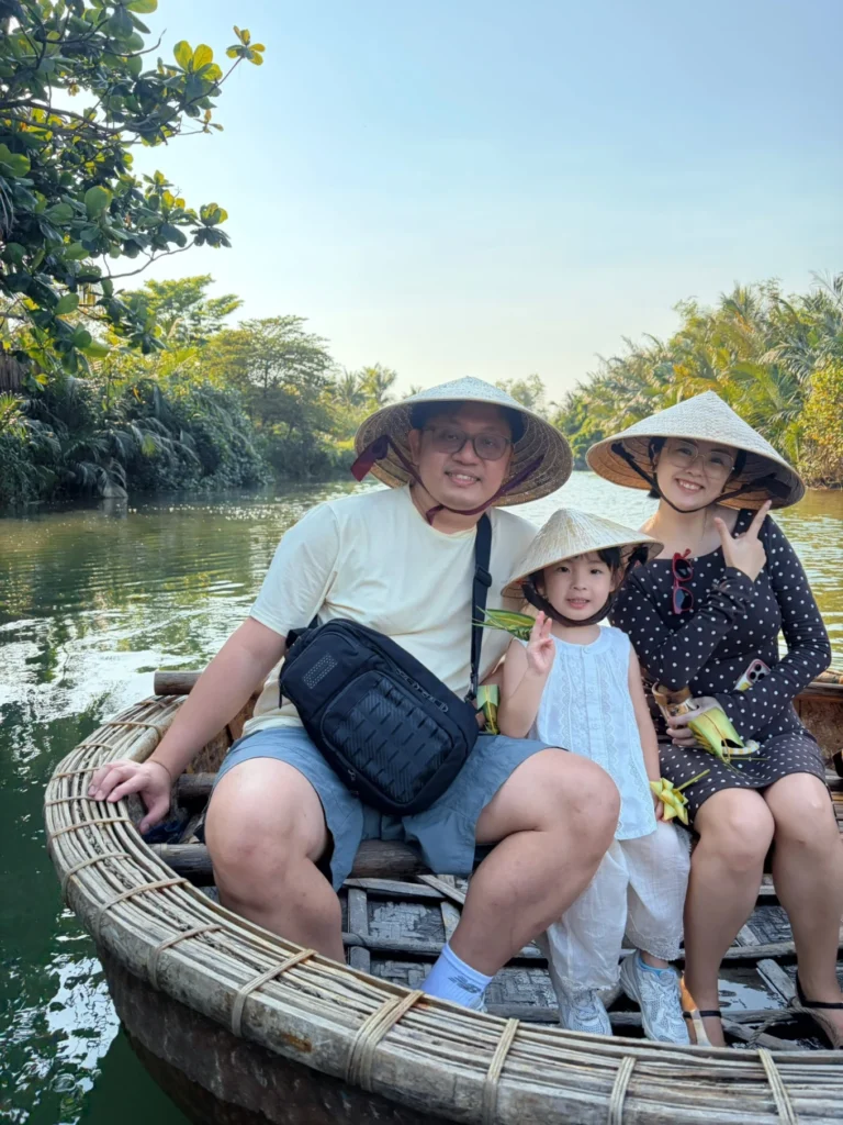 Family basket boat ride experience in Hoi An coconut forest