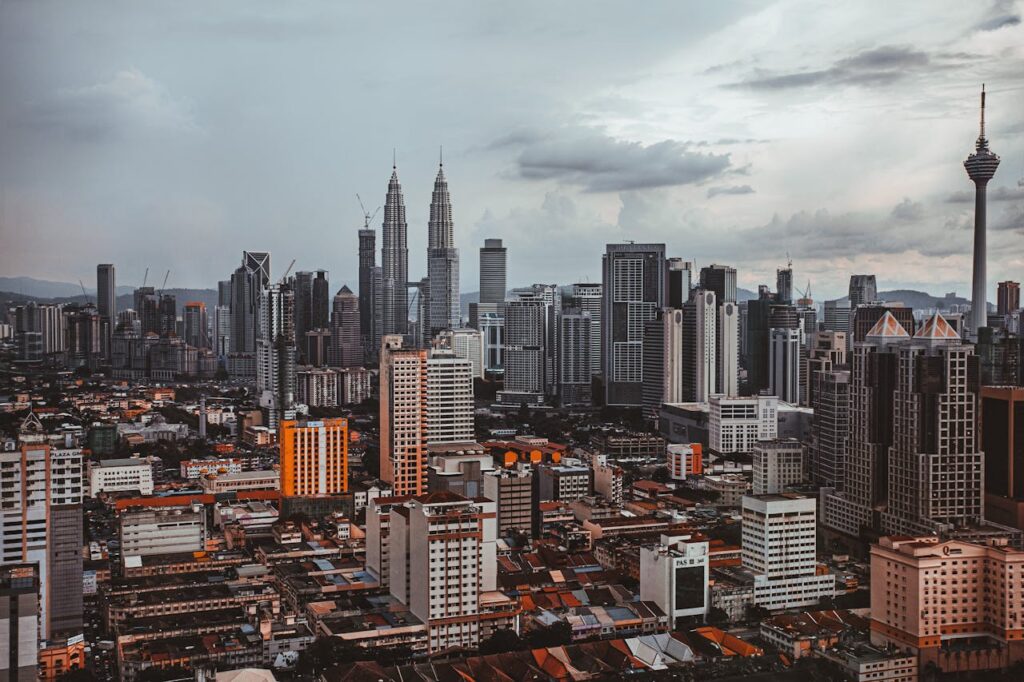 Kuala Lumpur skyline with Petronas Twin Towers and modern city buildings in Malaysia