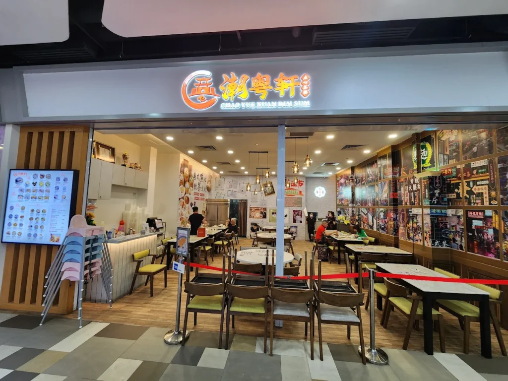 Where to Find the Best Dim Sum in Singapore (Local Picks) 11 Entrance and dining area of Chao Yue Xuan Dim Sum, a modern Cantonese dim sum restaurant in Singapore.