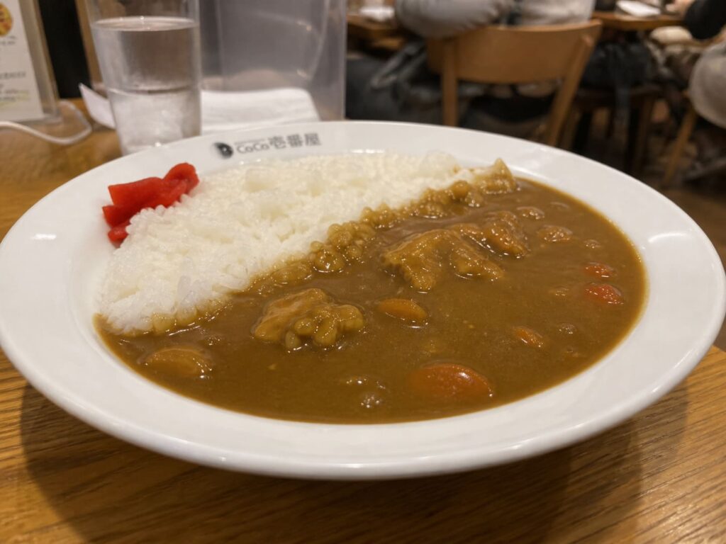 Kid-Friendly Foods to Try in Japan That Aren’t Sushi 8 Japanese curry rice with chicken and vegetables served with white rice in a casual restaurant setting