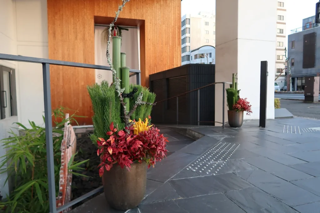 10 Best Muslim-Friendly Hotels (Halal) In Kyoto 11 Entrance walkway and traditional Japanese decorative arrangement at Hotel Kanra Kyoto in Kyoto, Japan